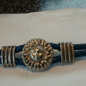 Silver Toned Sun Bracelet w/a Leather Like Design